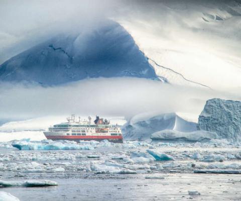 Hurtigruten ship sailing in Antarctica