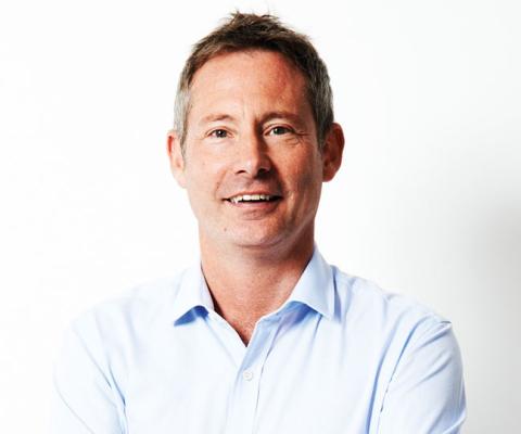 Tui's UK boss Andrew Flintham has apologised for delays handling customers cancelled bookings