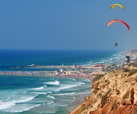 Paragliding over the beach. Netanya, Israel. Image: Eduard Stern