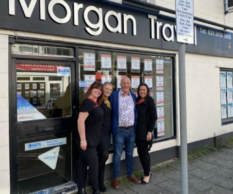 Simon Morgan (centre right) with the Morgan Travel team