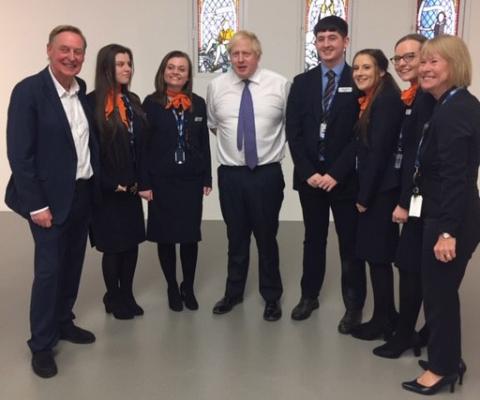 Hays Travel staff with Boris Johnson