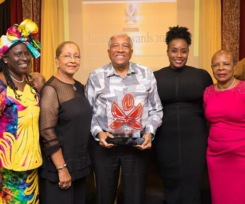 Sir Royston Hopkin pictured receiving an Outstanding Achievement Award in 2019