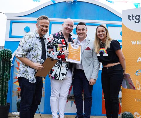 Richard Tolley collects his Travel Pride Champion certificate in 2019