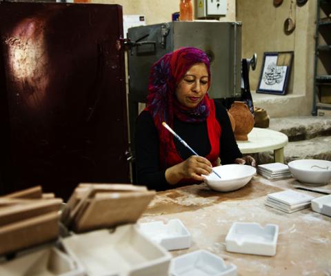 Iraq al Amir woman painting pottery
