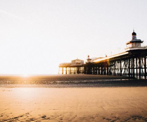 Freeth said June was proving popular for forward bookings (Pictured: Blackpool beach. Credit Luke Ellis Craven / Unsplash)
