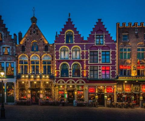 Trips include a four-day Bruges break (Olivier Depaep / Unsplash)