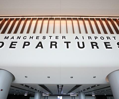 Manchester airport passengers experienced long security delays this summer
