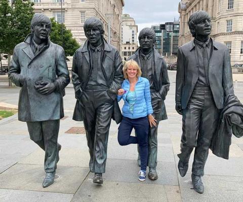 Writer Sara by the Beatles statue in Liverpool