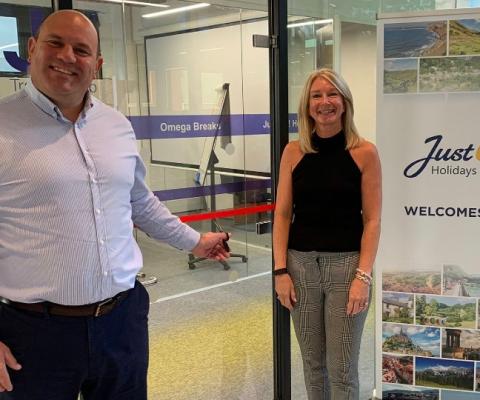 Chief executive Andy Freeth (left) and HR director Helen Moylan (right) officially open the second floor of the new office space