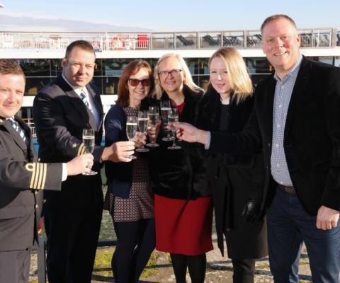 The christening ceremony was attended by corporate captain Marco Menke and godmother, college exam officer Catherine Hawkins 
