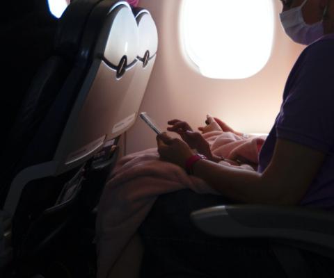 Masks will remain mandatory on US flights until 18 April (Credit: Elly Johnson / Unsplash)