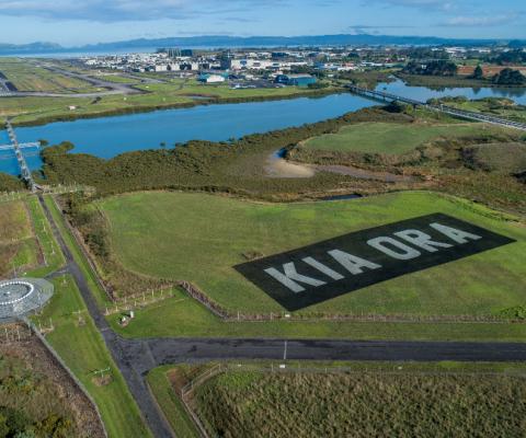Large_Kia_Ora_sign_at_Auckland_Airport_greets_the_first_ar.jpg