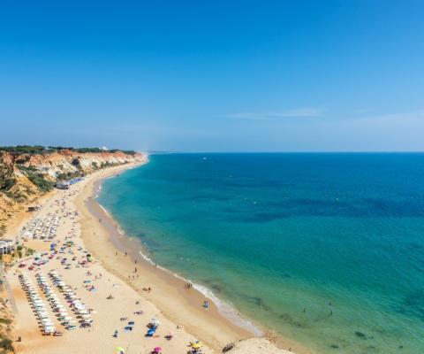 The conference will be held in Olhos de Agua in the Algarve (pictured: Praia da Falesia) (Credit: iStock)
