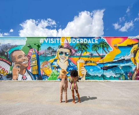 RE_Young_women_in_front_of_public_mural_in_Fort_Lauderdale_METhumb..jpg