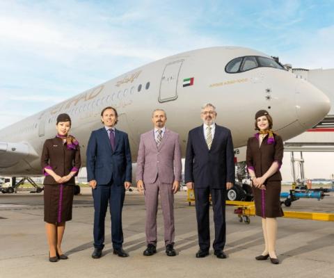 Heathrow chief commercial officer Ross Baker (second left) was among those to welcome the A350 to Heathrow