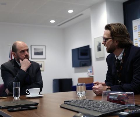 Roads and local transport minister Richard Holden with Matthew Campbell-Hill (right)