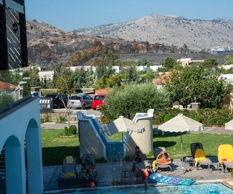 ‘In Rhodes, there is defiance – they won't be beaten by these wildfires’