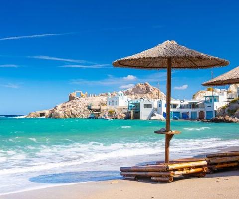 Beach_Greece_Island_Milos_Coast_Parasol_iStock-1455045956.jpg