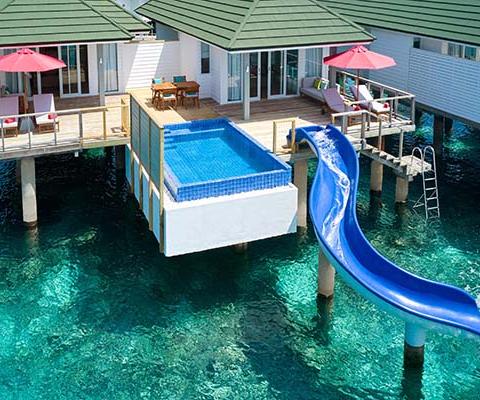A two-bedroom Lagoon Villa with a slide at Siyam World in the Maldives