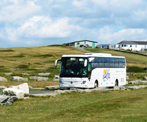 Alfa_Coach_arrving_onto_Portland_Bill_-_Photo_by_Dave_Bickle.jpg