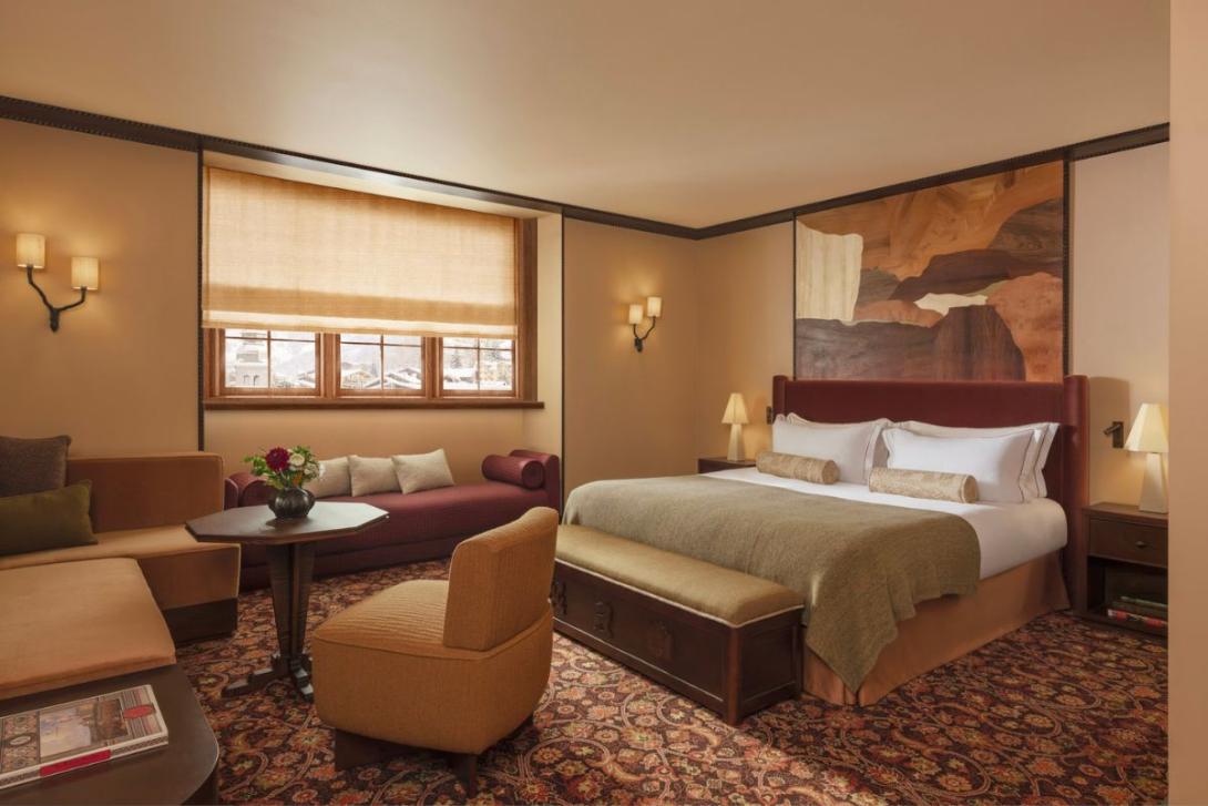 Luxury hotel bedroom with warm furnishings