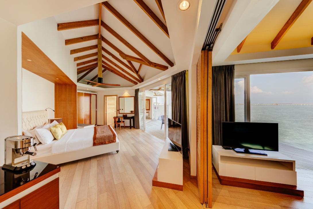 Luxurious villa bedroom in Maldives overlooking sea