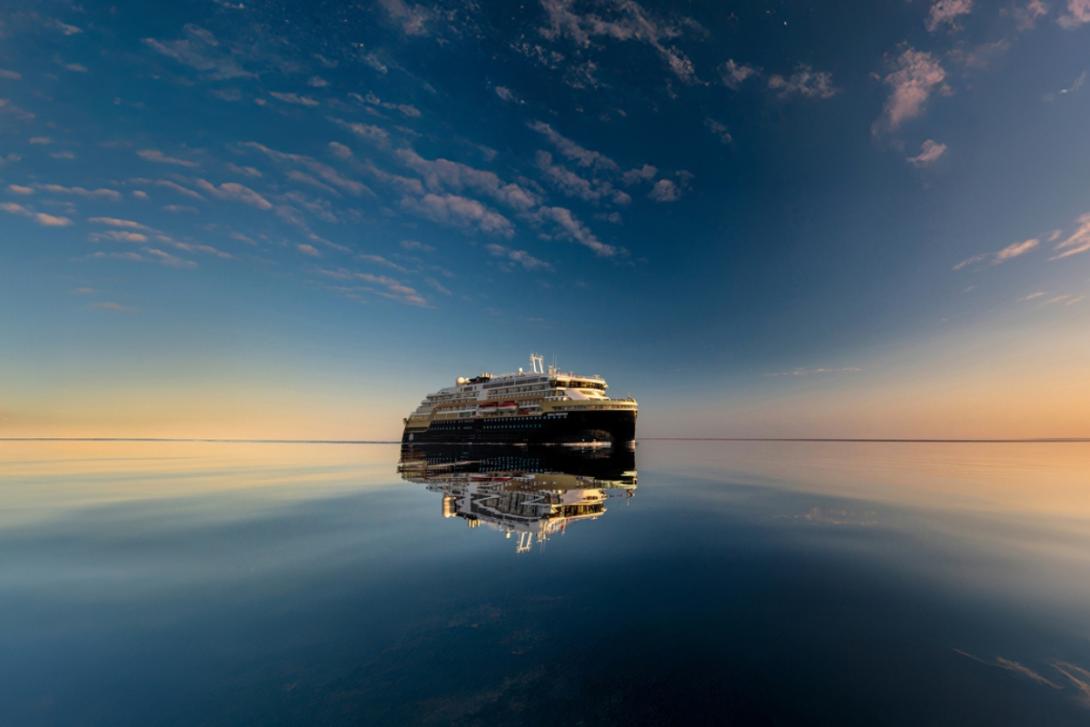 HX Expeditions HX Expeditions ship sailing across ocean