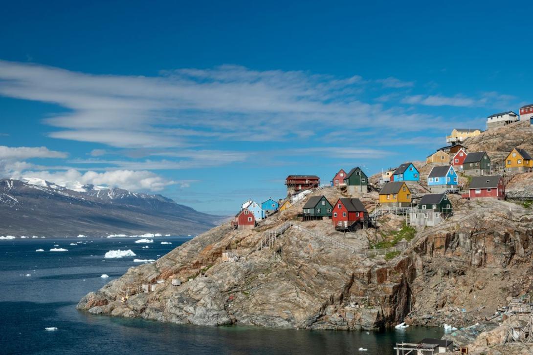 HX Expeditions Colourful houses on rocky coastline