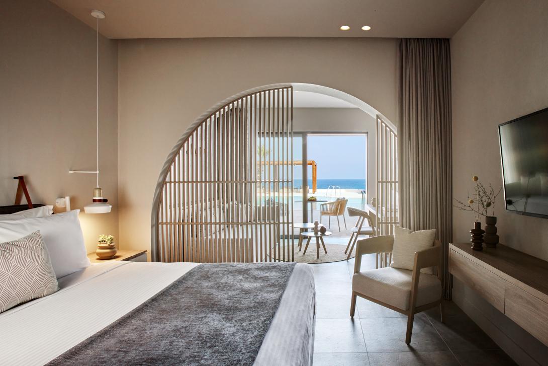 A Junior Suite with a sea view and shared pool