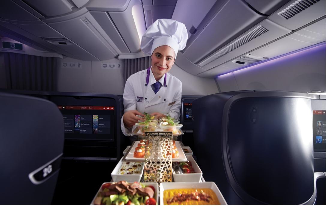 Chef serving food on a Turkish Airlines plane