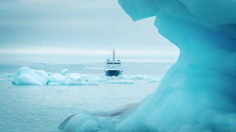 The ship Polar Athena sits in sea ice - credit Lars Korvald for Secret Atlas