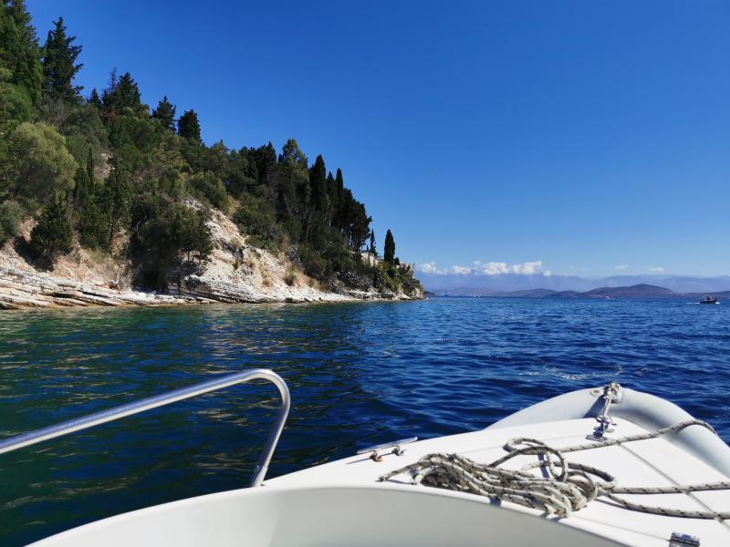 Hiring a boat offers a different view of Corfu's coastline