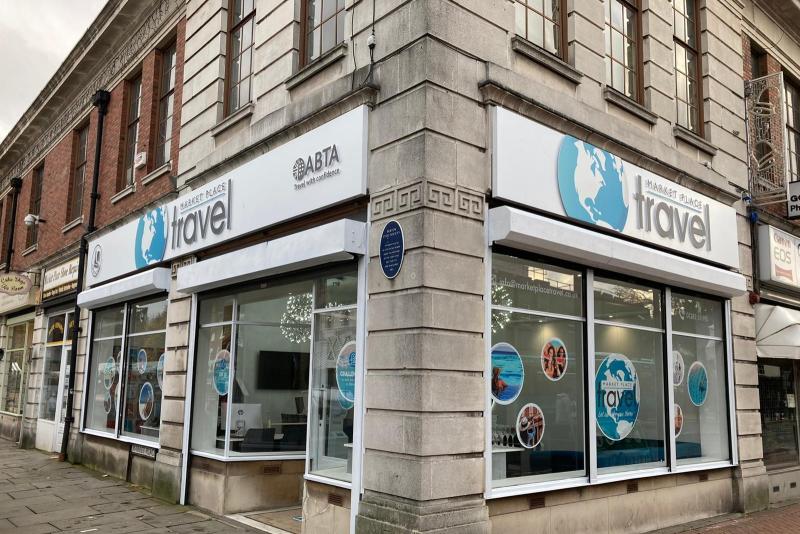 Agency celebrates relocating to larger shop