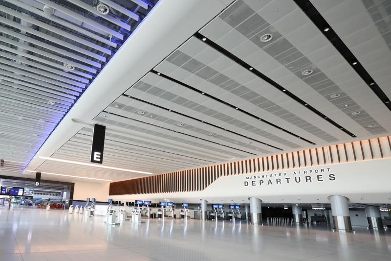 Manchester airport says its systems are ‘back up and running’