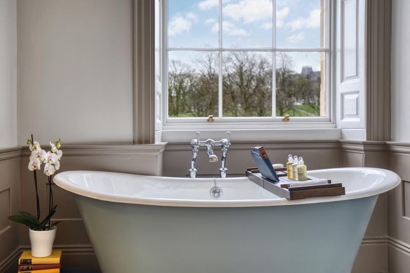 A roll-top bath in the Junior Suite