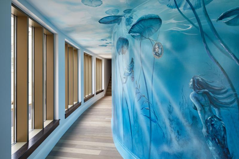 The Mermaid Corridor is a long, floor-to-ceiling mural by English artist Katie Bird