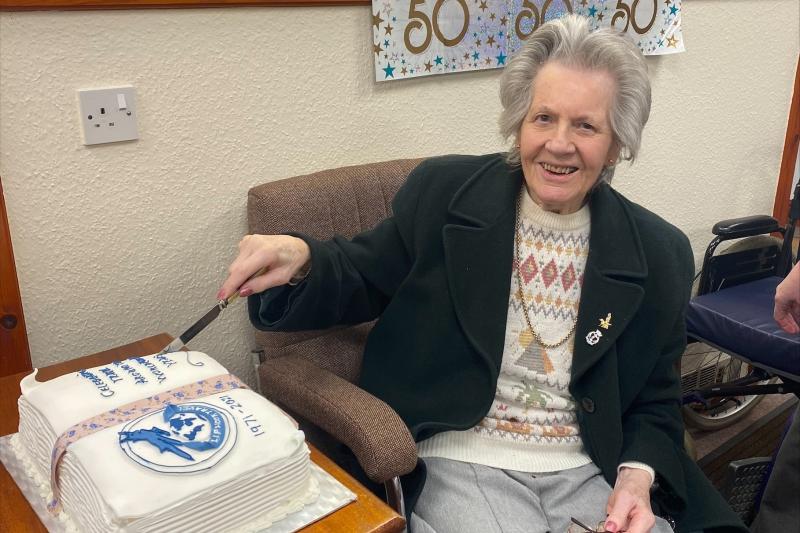 Liphook Travel founder Jean Meech paid the team a visit to mark its 50th birthday