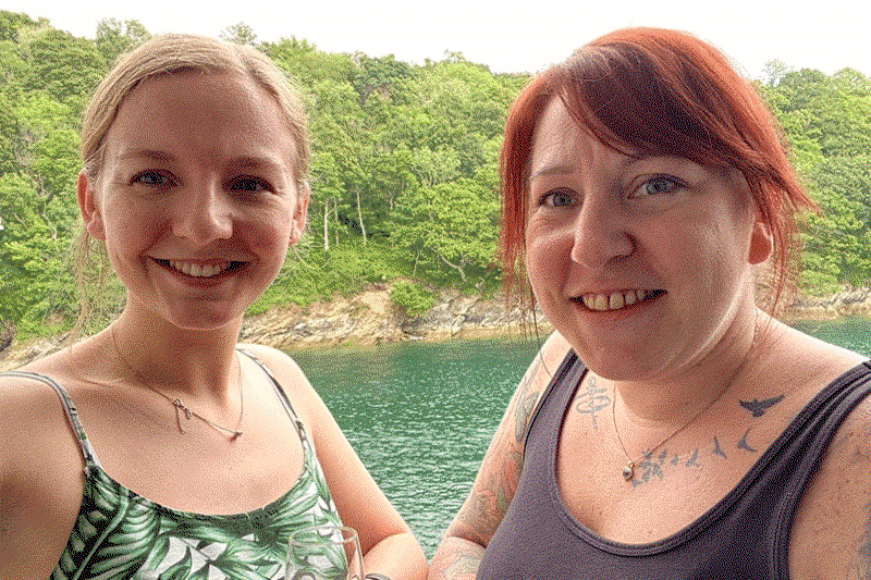 Panache's Olivia Edwards and Emma Taylor on the balcony of their Deluxe Veranda Suite