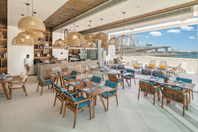  Guests can enjoy beach-side Mediterranean dining at The Beach Bar and Grill