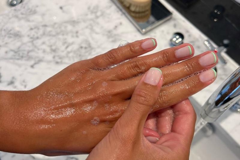 Harriet Westmoreland's signature French tips manicure uses Claridge's trademark jade colour 