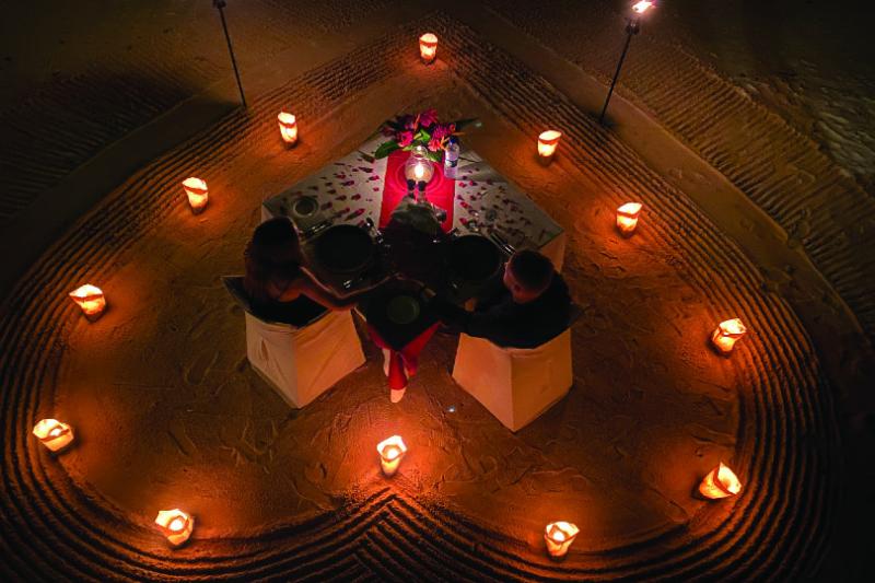 Tom and his fiancee Laura enjoy a romantic meal in Mauritius