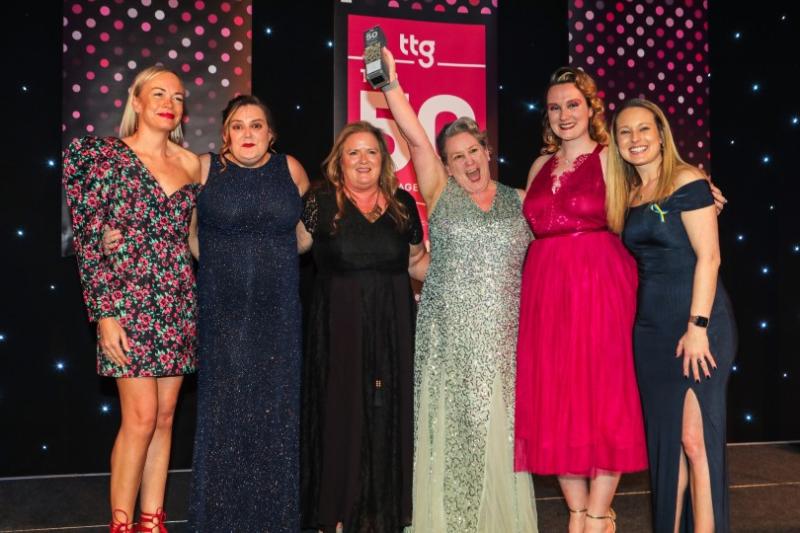 Gillian and her team collect their TTG Top 50 award