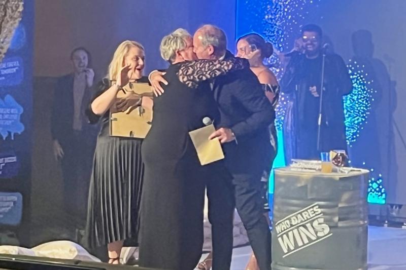 Park and Coatman embrace moments after they got engaged up on stage
