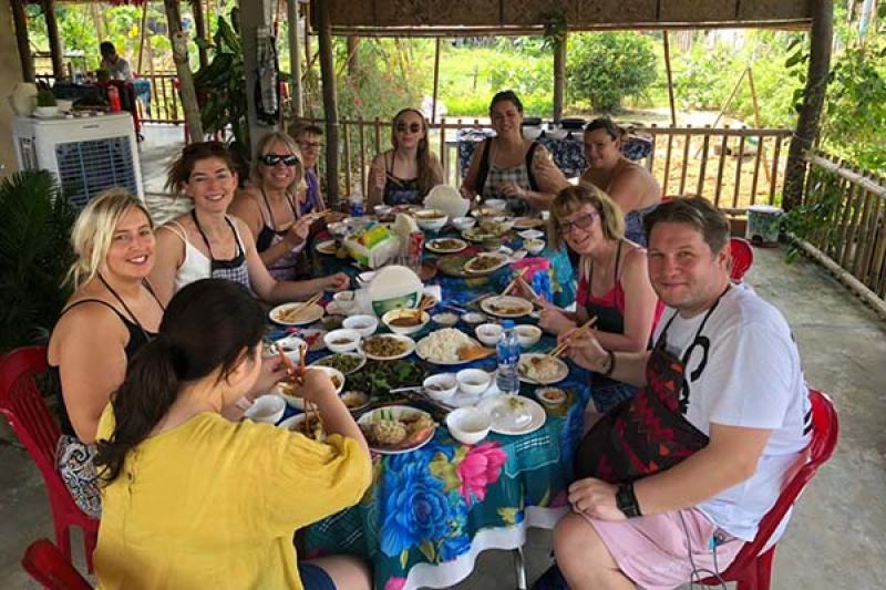 The group tuck into a delicious Vietnamese spread from the Phap family