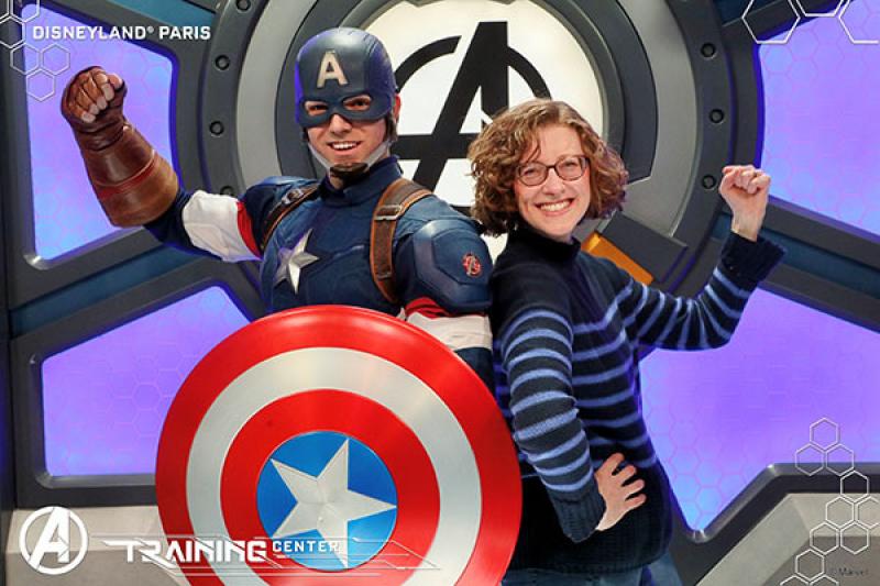 Charlotte learns how to pose like a pro with Captain America at the Hero Training Centre