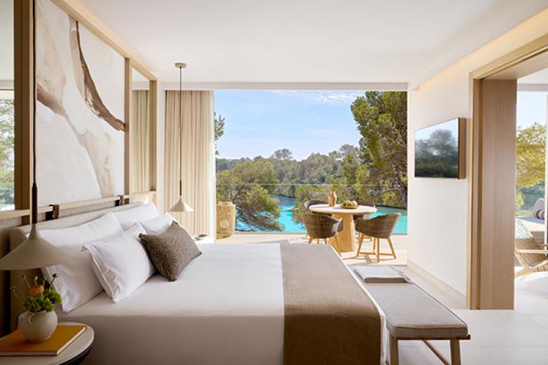A deluxe one-bedroom sea view room at Ikos Porto Petro
