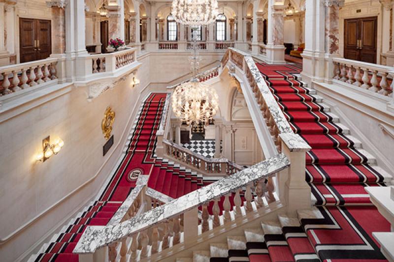 The restored staircase at Raffles London at the OWO