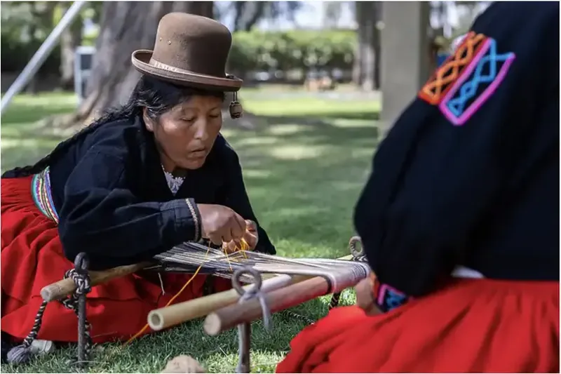 Peruvian woman weaving