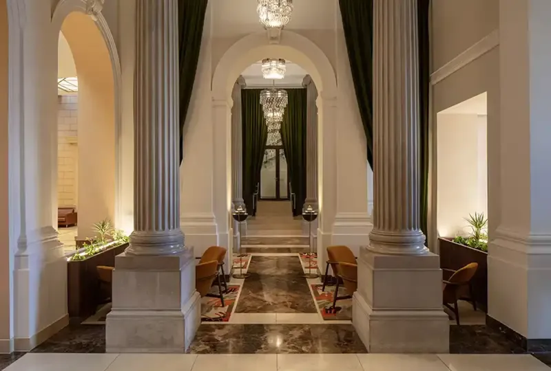 The property boasts many original features designed by Hansen, including his trademark Greek columns 