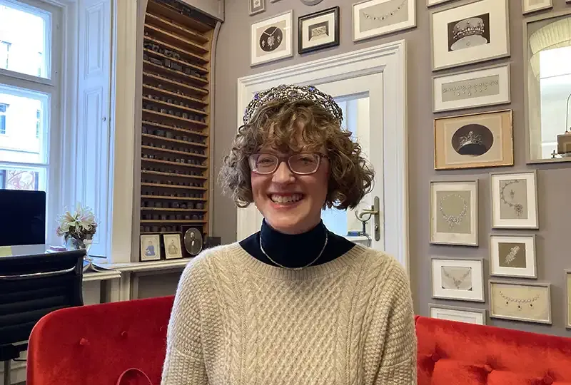 Charlotte tries on a €300,000 tiara at A.E.Kochert jewellers, premises designed by Hansen